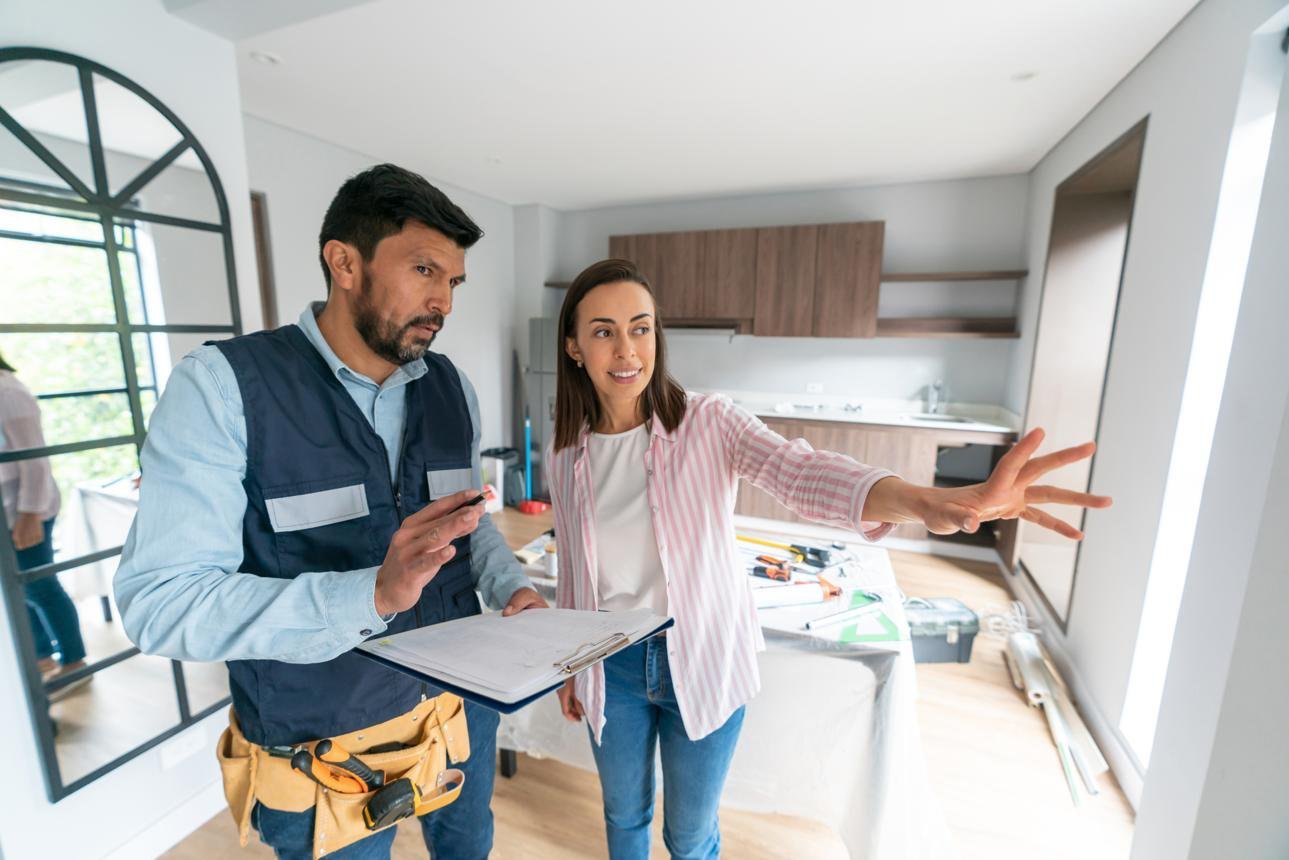 Homeowner discussing the project during a walkthrough